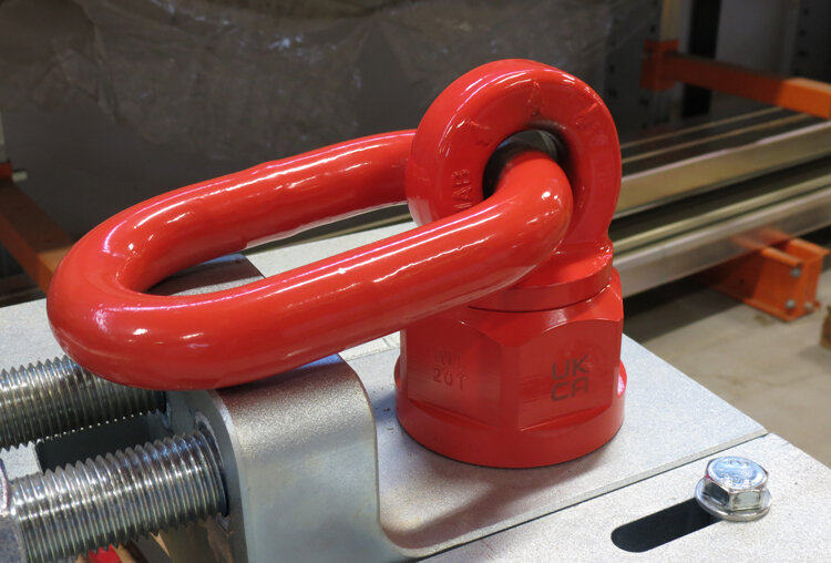 Swivel lifting eye mounted on product