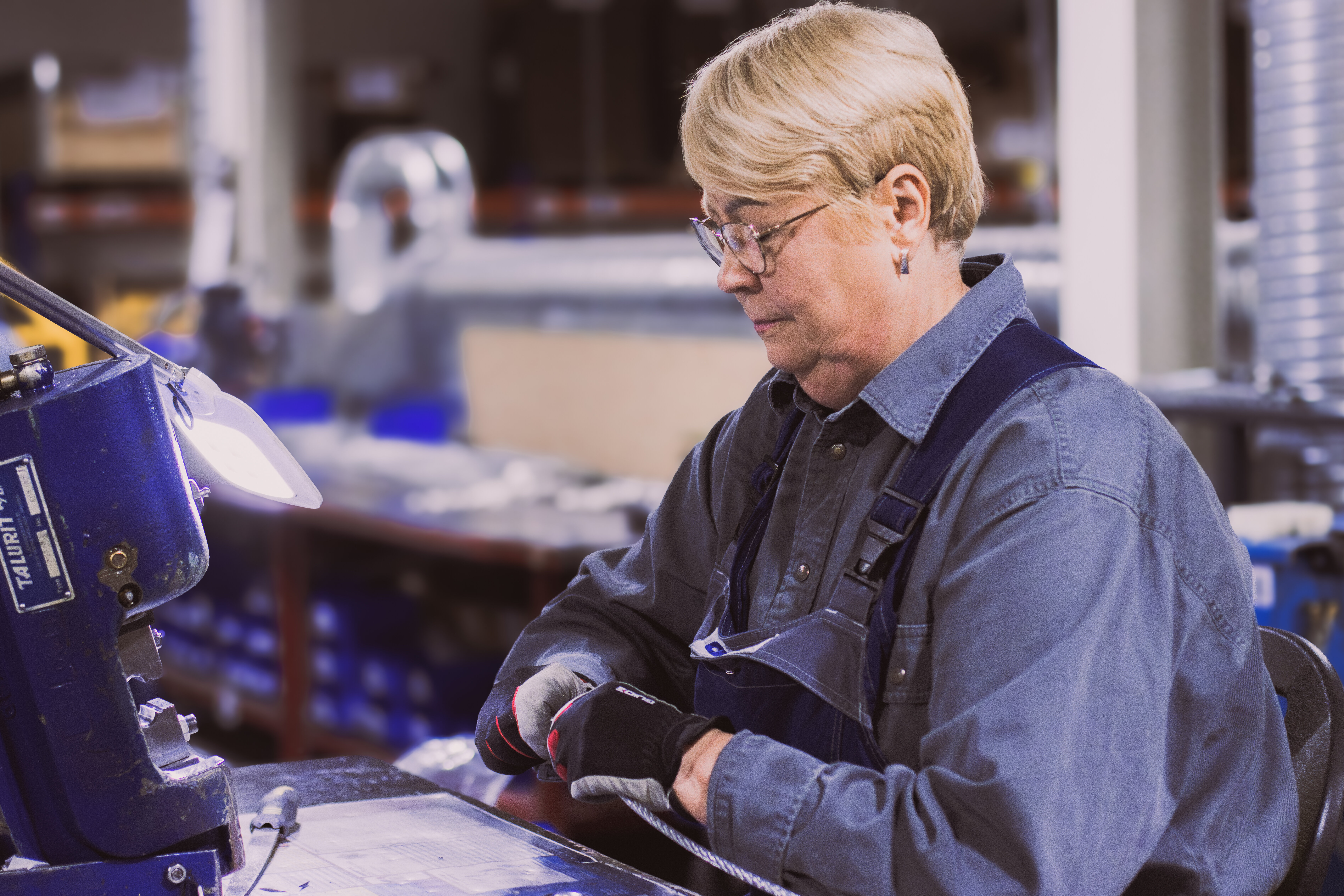 Woman working with steel wire